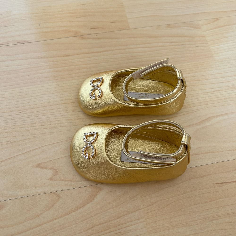 Dolce & Gabbana goldene Babyschuhe